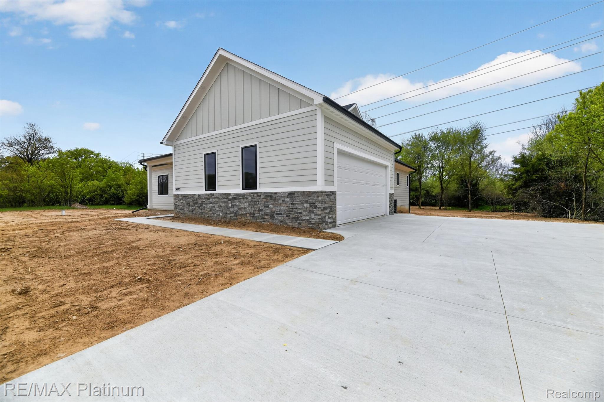 Side entry garage and driveway at 3073 Gecko Trail