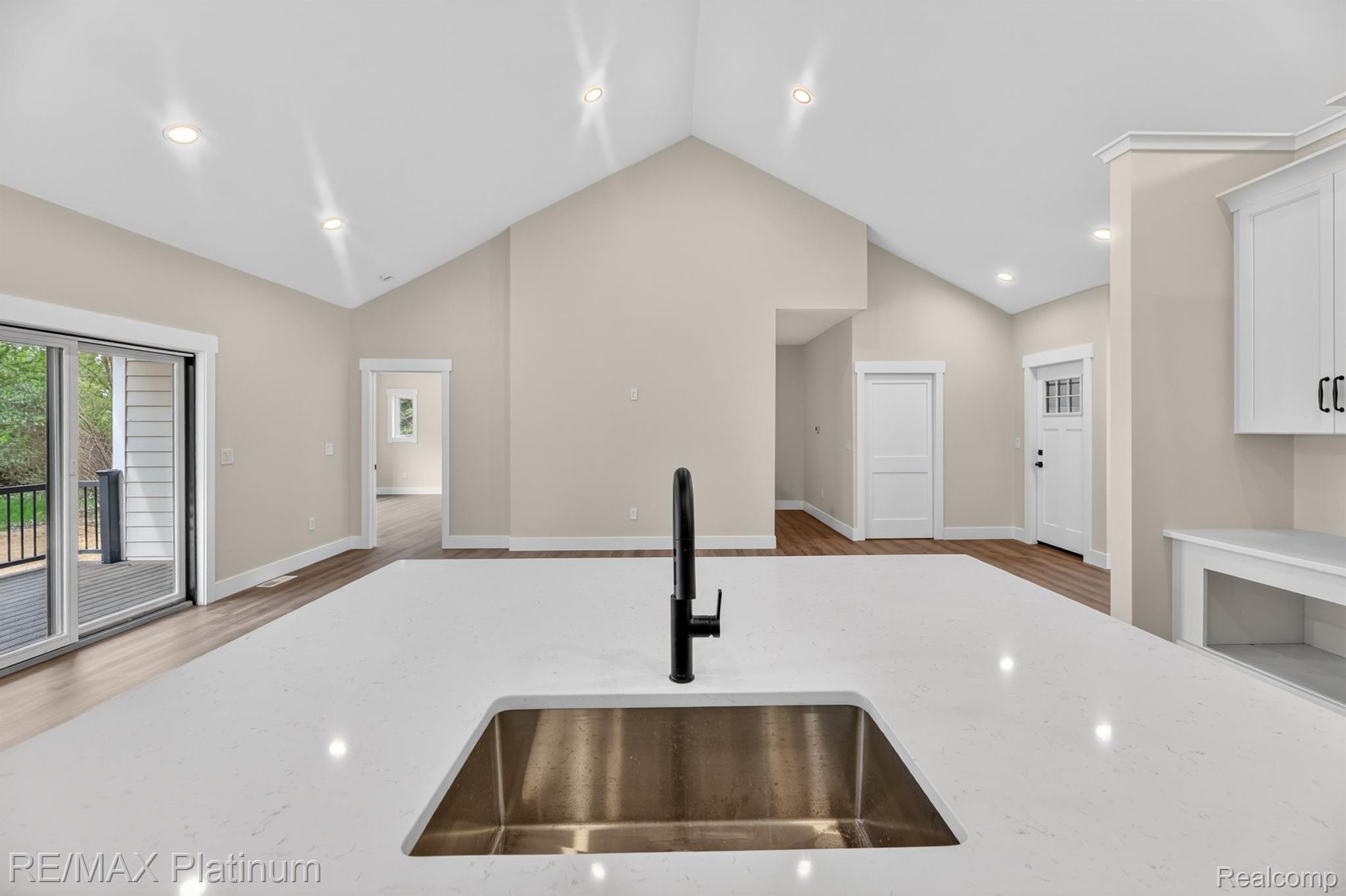 View from kitchen sink toward open living area