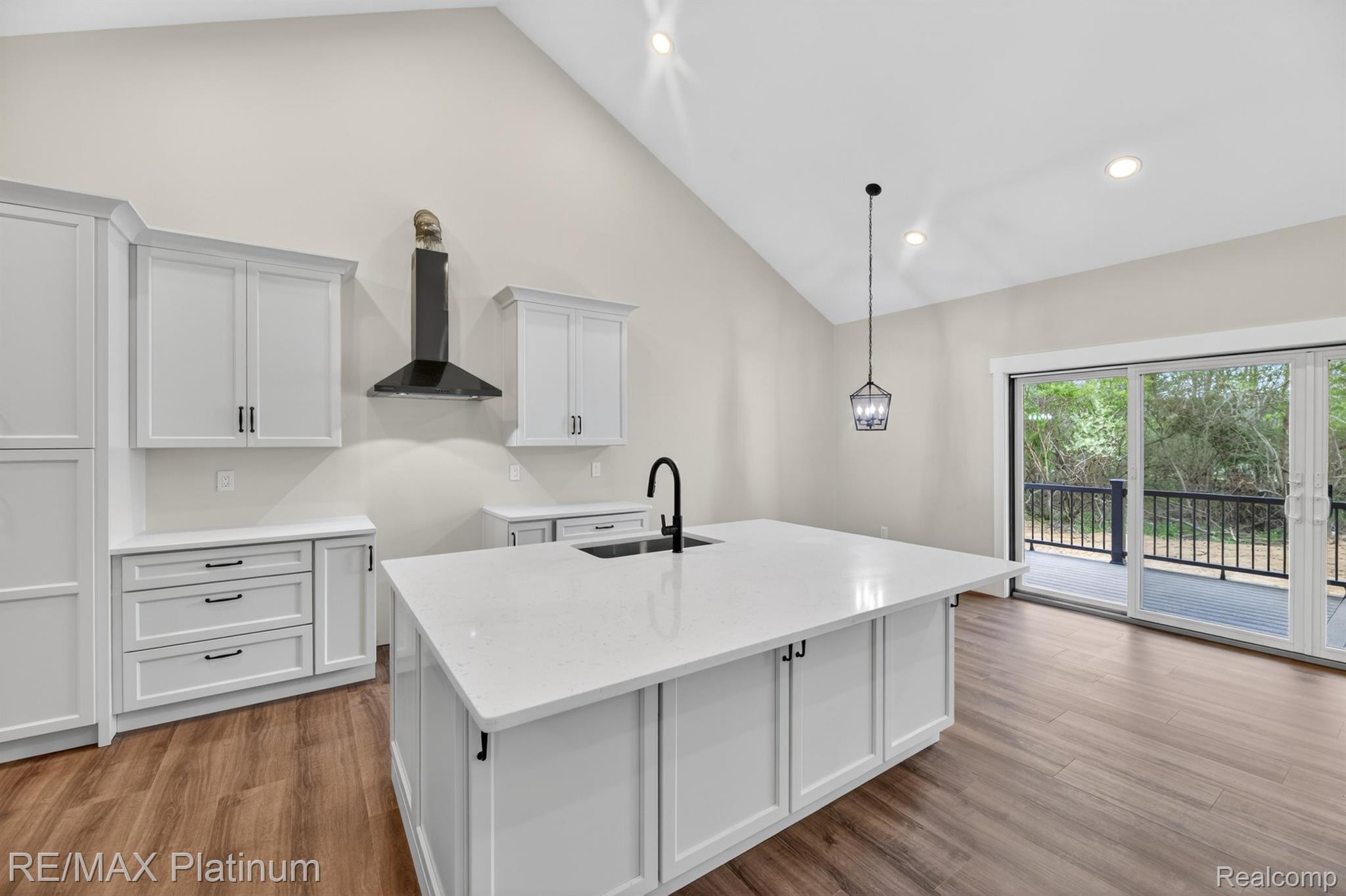 Kitchen island and sliding doors to deck