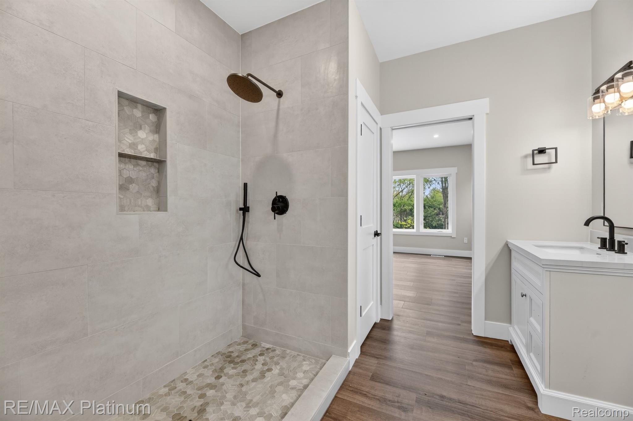 Walk-in shower and vanity at 3073 Gecko Trail